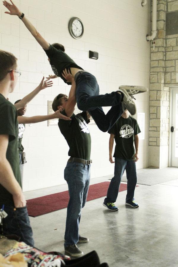 Senior Xavier Hayden lifts senior Isaiah Koppes recreating the dirty dancing scene