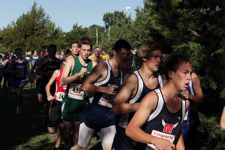 Junior Austin Telck, junior Grant Wagner and senior Dalen Musick race for  Junior Varsity