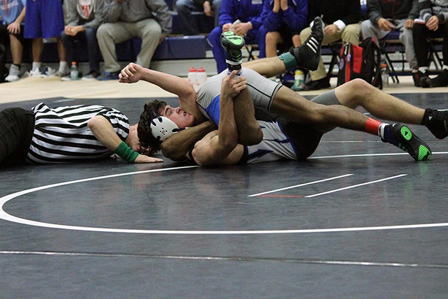 Wrestling takes eighth, finishes with three third place individuals