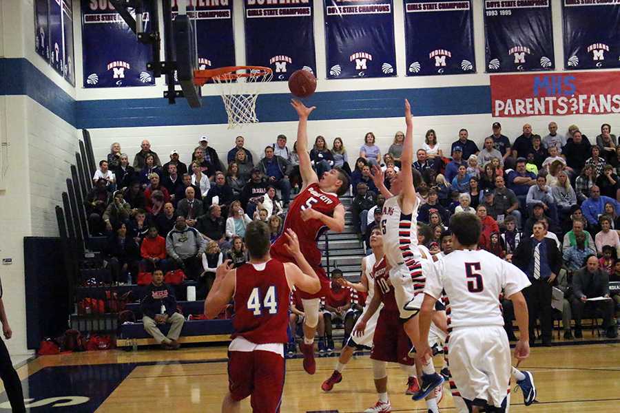 Boys Basketball pulls a close win against Dodge City