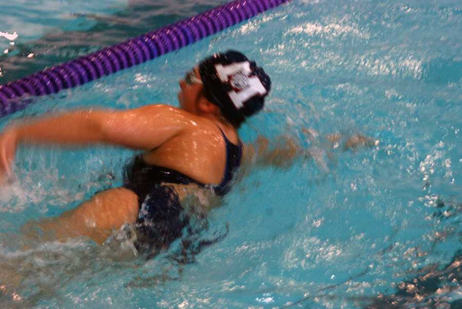 Swim improves, finishes second at home meet