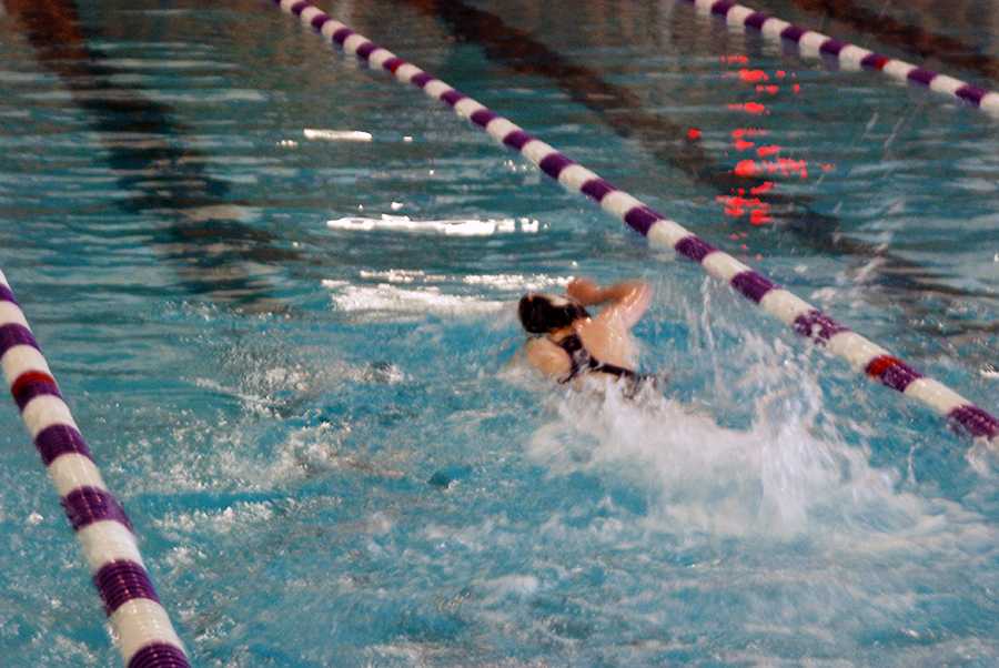 Swim improves, finishes second at home meet