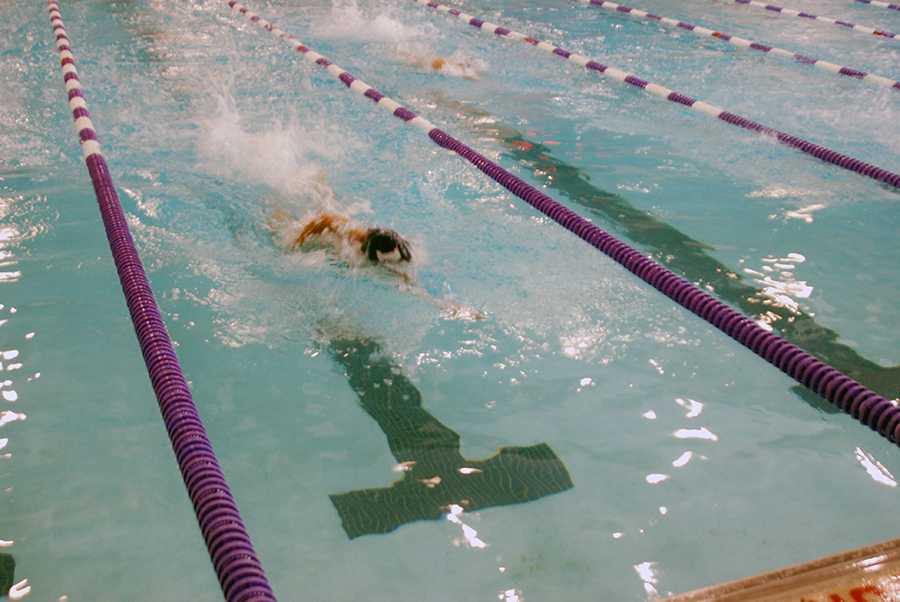 Swim improves, finishes second at home meet