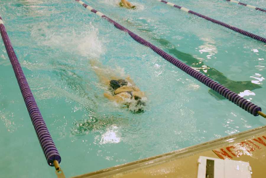 Swim improves, finishes second at home meet