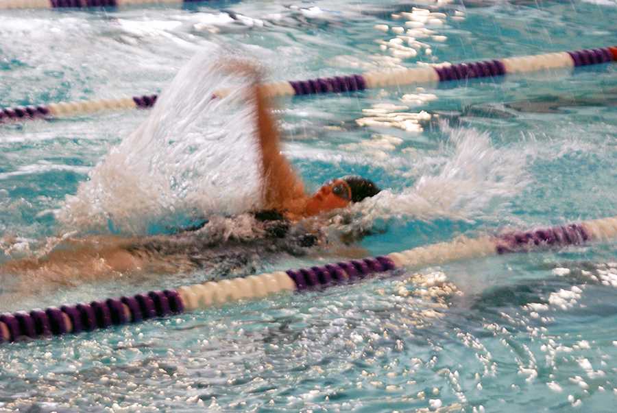 Swim improves, finishes second at home meet