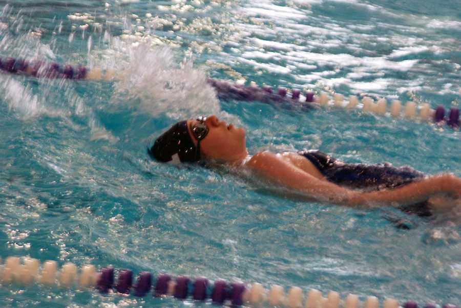 Swim improves, finishes second at home meet