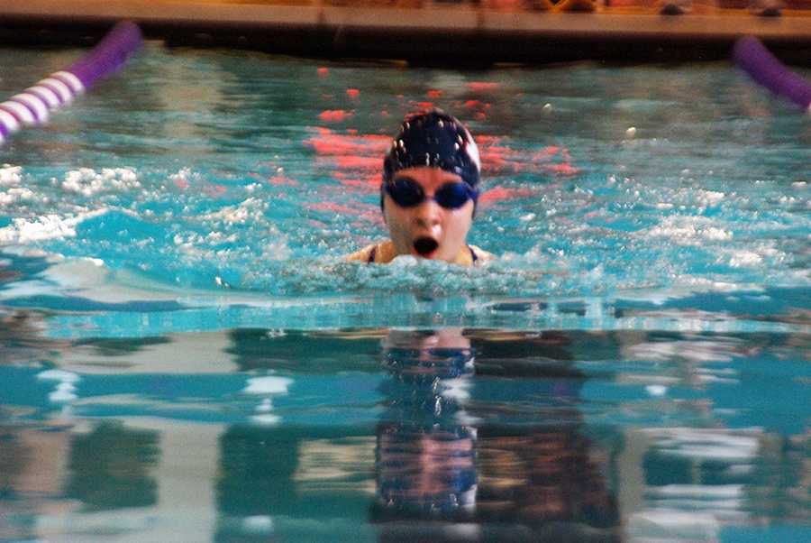 Swim improves, finishes second at home meet