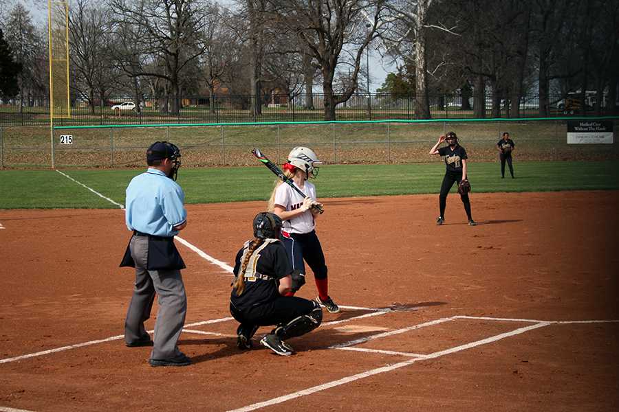 Softball wins opening game 9-2, loses second 3-4