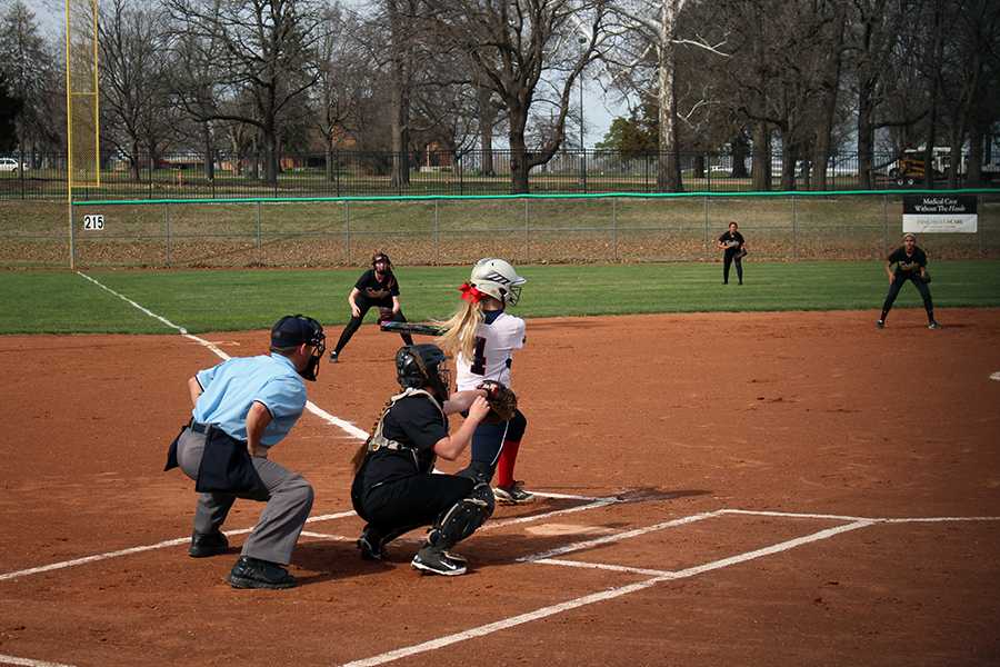 Softball wins opening game 9-2, loses second 3-4