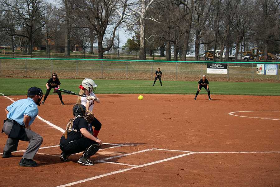 Softball wins opening game 9-2, loses second 3-4